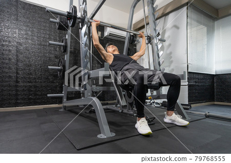 Middle-aged man training in the gym Middle-aged man training in the gym 79768555