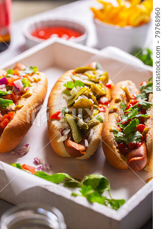 Hot dogs with different mexican toppings, close up Hot dogs with different mexican toppings, close up 79768960