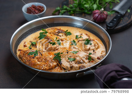 Cajun chicken in a creamy sauce prepared in a pan Cajun chicken in a creamy sauce prepared in a pan 79768998