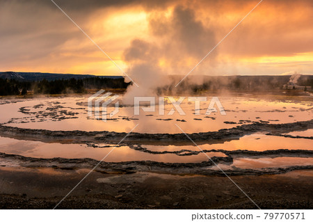 Golden scene of fountain geyser basin in Yellowstone. Golden scene of fountain geyser basin in Yellowstone. 79770571