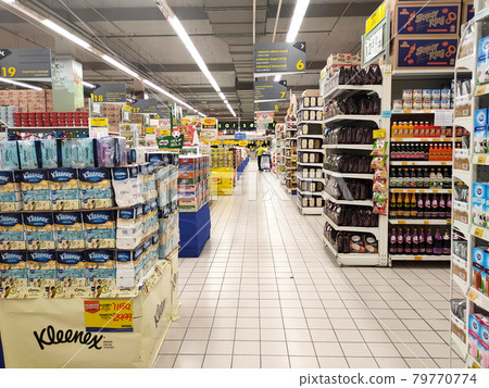 SEREMBAN, MALAYSIA -MARCH 16, 2021: Interior of a huge hypermarket. Daily necessities and groceries are displayed on sales shelves and price tagged. Sorted by type and brand. 79770774