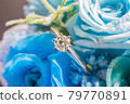 Rose bouquet and diamond engagement ring 79770891