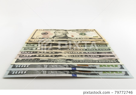 US american dollar money bills spread on white background US american dollar money bills spread on white background 79772746
