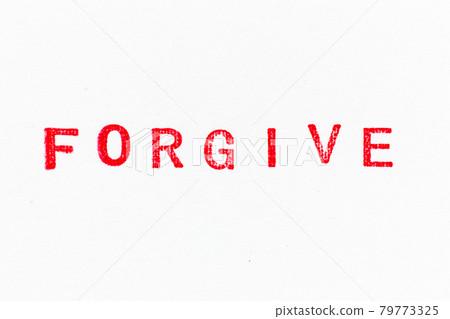 Red color ink rubber stamp in word forgive on white paper background 79773325