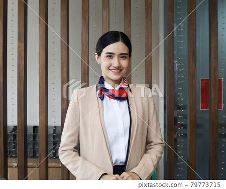Beautiful Asia reception woman on front at hotel for welcome customer in holiday weekend. 79773715