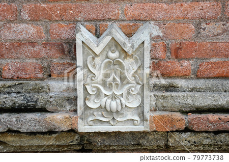JOGJAKARTA, INDONESIA -JUNE 12, 2014: Stone work design and detail at Old Masjid Besar Mataram Kotagede, Jogjakarta Indonesia. According to history, the mosque was build on 1575. JOGJAKARTA, INDONESIA -JUNE 12, 2014: Stone work design and detail at Old Masjid Besar Mataram Kotagede, Jogjakarta Indonesia. According to history, the mosque was build on 1575. 79773738