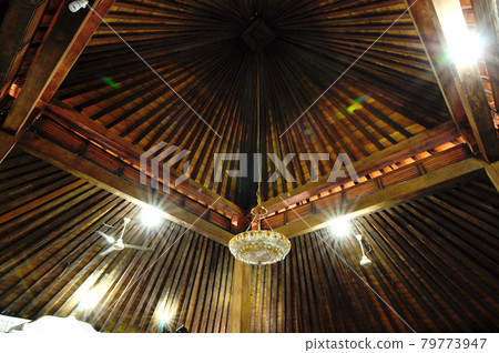 JOGJAKARTA, INDONESIA -JUNE 12, 2014: Interior of old Masjid Besar Mataram Kotagede, Jogjakarta Indonesia. According to history, the mosque was build on 1575. JOGJAKARTA, INDONESIA -JUNE 12, 2014: Interior of old Masjid Besar Mataram Kotagede, Jogjakarta Indonesia. According to history, the mosque was build on 1575. 79773947