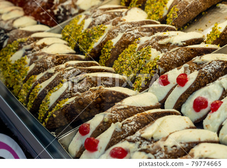 typical Sicilian cannoli stuffed with ricotta. Traditional homemade recipe 79774665