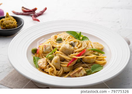 Spaghetti with Green Curry Sauce with Fish Balls (Spaghetti kaeng Khiao Waan),Thai fusion food Spaghetti with Green Curry Sauce with Fish Balls (Spaghetti kaeng Khiao Waan),Thai fusion food 79775326