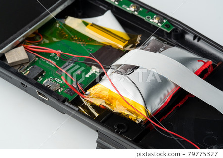 swollen battery,Old Battery Swelling In The Car Camera 79775327