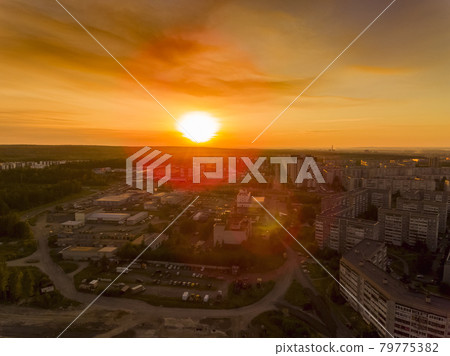 Aerial view of the sleeping neighbourhood of city at sunset in summer 79775382