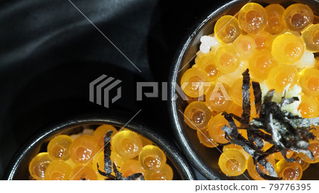 Ikura roe. Salmon Ikura Roe Served with rice and top with japanese Seaweed. Ikura don very famous menu in Hokkaido Japan. Most Served in hotel buffet breakfast. salmon roe or red caviar. Japanese food 79776395