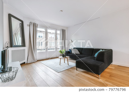 Modern furniture in a bright living room Modern furniture in a bright living room 79776796