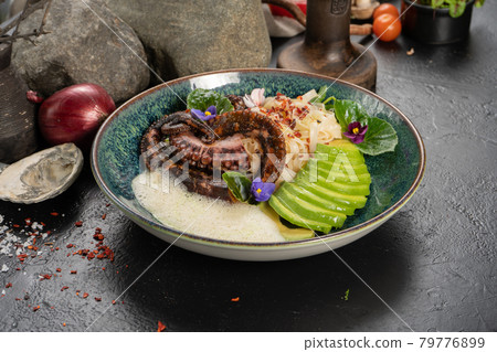 Octopus with noodles and avocado Octopus with noodles and avocado 79776899