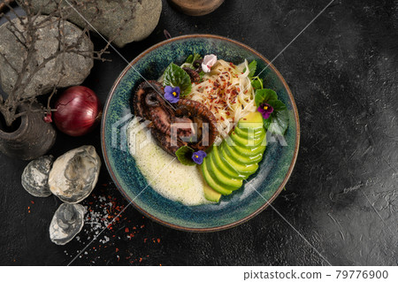Octopus with noodles and avocado Octopus with noodles and avocado 79776900