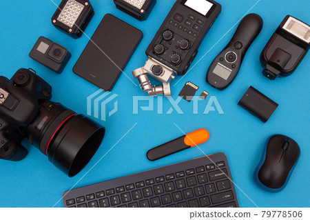 Workplace With Digital Gadgets on Blue Table 79778506