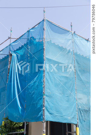 Scaffolding for housing construction site Scaffolding for housing construction site 79786046