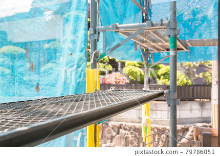 Scaffolding for housing construction site Scaffolding for housing construction site 79786051