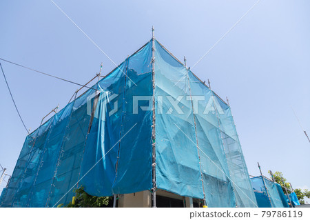 Scaffolding for housing construction site Scaffolding for housing construction site 79786119