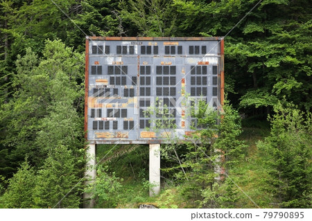 Abandoned winter olympic site at the ski jumping large hill in Saint-Nizier du Moucherotte, France Abandoned winter olympic site at the ski jumping large hill in Saint-Nizier du Moucherotte, France 79790895