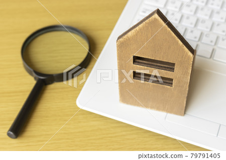 Image of searching a house on a laptop Image of searching a house on a laptop 79791405