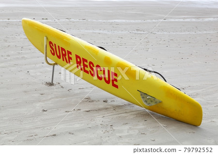 Surf rescue on a beach Surf rescue on a beach 79792552