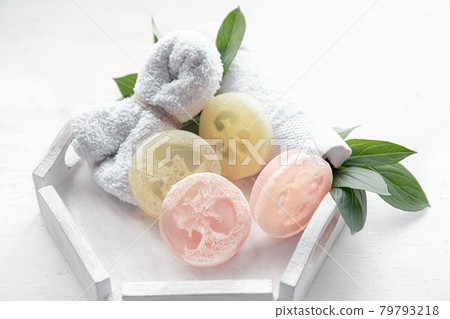 Spa still life with towel and loofah close up. 79793218
