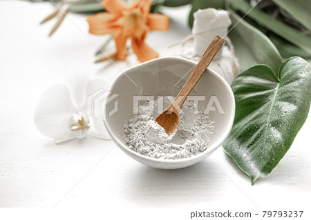 Spa composition with powder face mask and flowers. 79793237