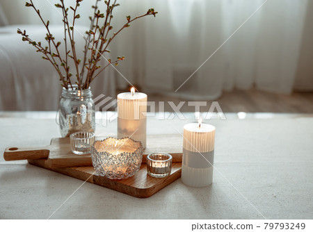 Home still life with burning candles as home decor details. 79793249