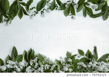 Floral arrangement with spring leaves and flowers copy space. Floral arrangement with spring leaves and flowers copy space. 79793325