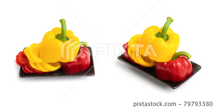 Top view of bell peppers. Fresh vegetables. Raw organic healthy food. Grocery and supermarket cooking and eating isolated on white background. Top view of bell peppers. Fresh vegetables. Raw organic healthy food. Grocery and supermarket cooking and eating isolated on white background. 79793380