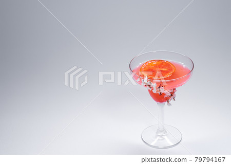 hemingway daiquiri cocktail drink with grapefruit in glass on white background hemingway daiquiri cocktail drink with grapefruit in glass on white background 79794167