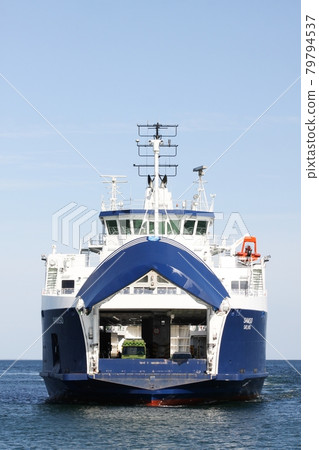 Ferry navigating between the harbor of Hou near Odder in Jutland and the idyllic Samsoe island 79794537