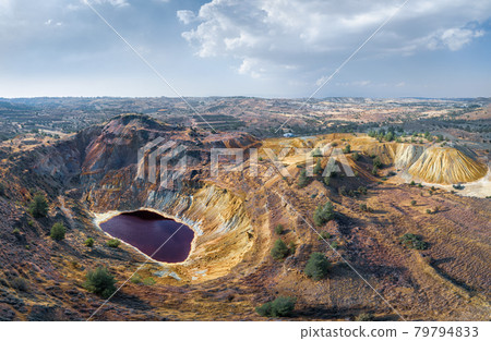 Toxic lake in abandoned open pit copper mine and waste heaps near Kampia, Cyprus Toxic lake in abandoned open pit copper mine and waste heaps near Kampia, Cyprus 79794833