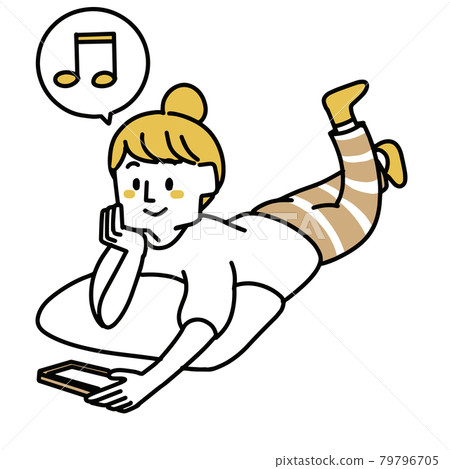 A woman watching a video on a tablet while lying down 79796705