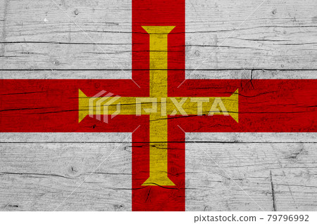 Flag of Guernsey. Wooden texture of the flag of Guernsey 79796992