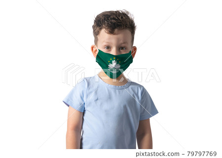 Respirator with flag of Macau. White boy puts on medical face mask isolated on white background Respirator with flag of Macau. White boy puts on medical face mask isolated on white background 79797769