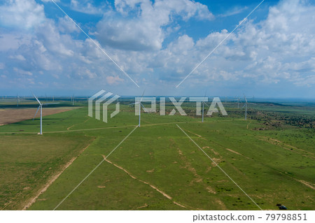 West Texas field of a larger wind farm with panoramic view wind blade generators West Texas field of a larger wind farm with panoramic view wind blade generators 79798851