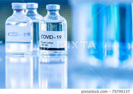 Bottle of COVOD-19 vaccine sample in a laboratory. Idea for researching and lab tests for coronavirus curing 79799137