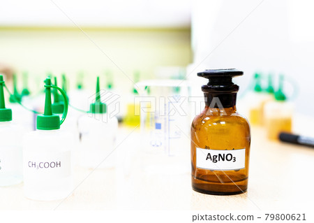 Chemical industry flask with liquid laboratory test tubes are on the table in the laboratory of Chemical industry flask with liquid laboratory test tubes are on the table in the laboratory of 79800621