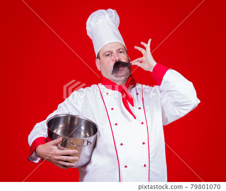 chef holding a pot with gesture okay 79801070