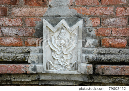 Stone work design and detail at Stone carving work with Javanese and Hindu influences. Located in the Old Grand Mosque of Mataram Kotagede, Jogjakarta Indonesia. Was build circa 1575. Stone work design and detail at Stone carving work with Javanese and Hindu influences. Located in the Old Grand Mosque of Mataram Kotagede, Jogjakarta Indonesia. Was build circa 1575. 79802432