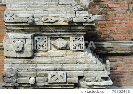 Stone work design and detail at Stone carving work with Javanese and Hindu influences. Located in the Old Grand Mosque of Mataram Kotagede, Jogjakarta Indonesia. Was build circa 1575. Stone work design and detail at Stone carving work with Javanese and Hindu influences. Located in the Old Grand Mosque of Mataram Kotagede, Jogjakarta Indonesia. Was build circa 1575. 79802436