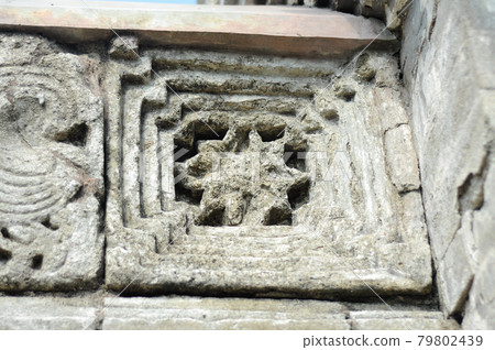 Stone work design and detail at Stone carving work with Javanese and Hindu influences. Located in the Old Grand Mosque of Mataram Kotagede, Jogjakarta Indonesia. Was build circa 1575. Stone work design and detail at Stone carving work with Javanese and Hindu influences. Located in the Old Grand Mosque of Mataram Kotagede, Jogjakarta Indonesia. Was build circa 1575. 79802439