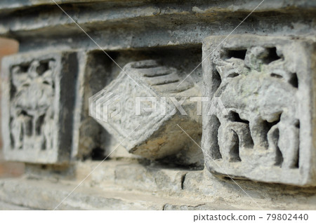 Stone work design and detail at Stone carving work with Javanese and Hindu influences. Located in the Old Grand Mosque of Mataram Kotagede, Jogjakarta Indonesia. Was build circa 1575. Stone work design and detail at Stone carving work with Javanese and Hindu influences. Located in the Old Grand Mosque of Mataram Kotagede, Jogjakarta Indonesia. Was build circa 1575. 79802440