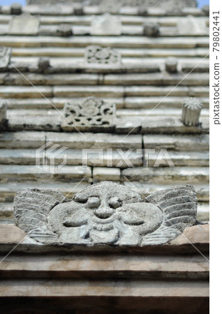 Stone work design and detail at Stone carving work with Javanese and Hindu influences. Located in the Old Grand Mosque of Mataram Kotagede, Jogjakarta Indonesia. Was build circa 1575. Stone work design and detail at Stone carving work with Javanese and Hindu influences. Located in the Old Grand Mosque of Mataram Kotagede, Jogjakarta Indonesia. Was build circa 1575. 79802441