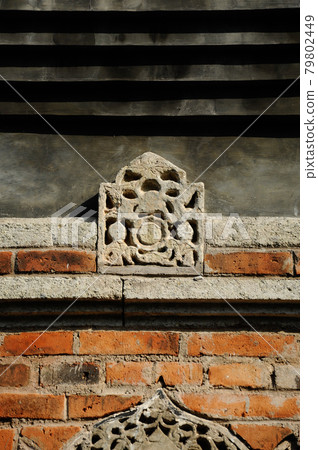 Stone work design and detail at Stone carving work with Javanese and Hindu influences. Located in the Old Grand Mosque of Mataram Kotagede, Jogjakarta Indonesia. Was build circa 1575. Stone work design and detail at Stone carving work with Javanese and Hindu influences. Located in the Old Grand Mosque of Mataram Kotagede, Jogjakarta Indonesia. Was build circa 1575. 79802449