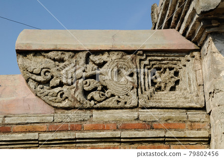 Stone work design and detail at Stone carving work with Javanese and Hindu influences. Located in the Old Grand Mosque of Mataram Kotagede, Jogjakarta Indonesia. Was build circa 1575. Stone work design and detail at Stone carving work with Javanese and Hindu influences. Located in the Old Grand Mosque of Mataram Kotagede, Jogjakarta Indonesia. Was build circa 1575. 79802456