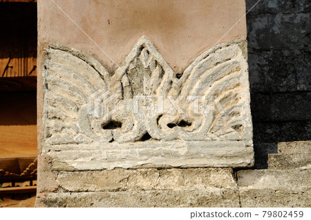 Stone work design and detail at Stone carving work with Javanese and Hindu influences. Located in the Old Grand Mosque of Mataram Kotagede, Jogjakarta Indonesia. Was build circa 1575. 79802459