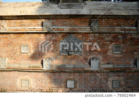 Stone work design and detail at Stone carving work with Javanese and Hindu influences. Located in the Old Grand Mosque of Mataram Kotagede, Jogjakarta Indonesia. Was build circa 1575. Stone work design and detail at Stone carving work with Javanese and Hindu influences. Located in the Old Grand Mosque of Mataram Kotagede, Jogjakarta Indonesia. Was build circa 1575. 79802464